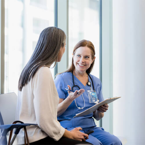 Doctor Talking to patient with smile